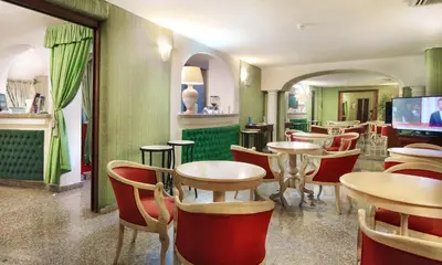 Area soggiorno di Colonna Palace Hotel Mediterraneo