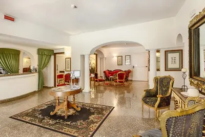 Area soggiorno di Colonna Palace Hotel Mediterraneo