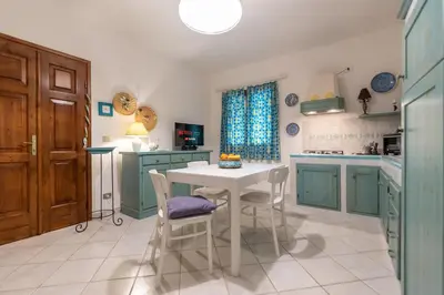 Cucina o angolo cottura di Cala Liberotto-Casa relax con veranda