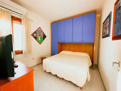 Letto o letti in una camera di Appartamento vicino al centro di Olbia