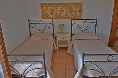Letto o letti in una camera di Casa Vacanze 