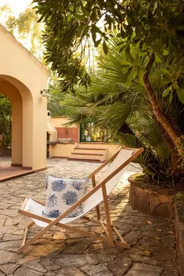Giardino di Cala Liberotto-Raffinata taverna con camino