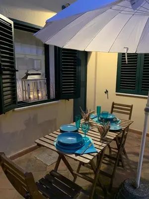 Patio o area all'aperto di Cala Liberotto-Raffinata taverna con camino