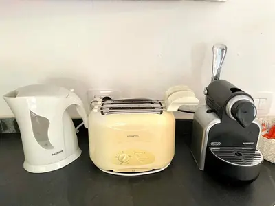 Set per la preparazione di tè e caffè presso SAN TEODORO PUNTA EST CURATISSIMO BILOCALe