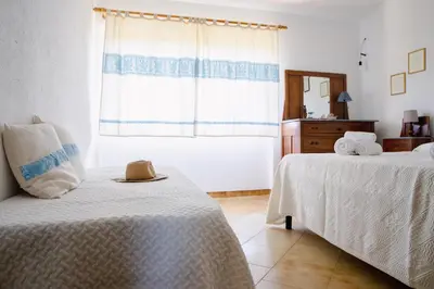 Letto o letti in una camera di Residenze di Via Magnolie
