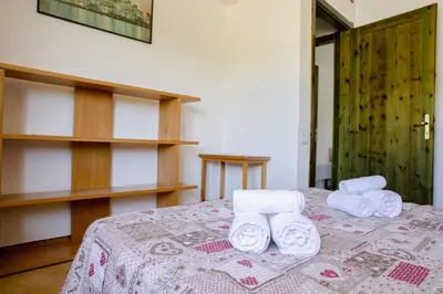Letto o letti in una camera di Residenze di Via Magnolie