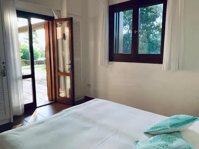 Letto o letti in una camera di BouganVilla by the Beach - San Teodoro 1