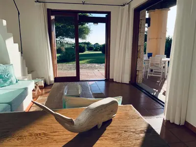 Area soggiorno di BouganVilla by the Beach - San Teodoro 1