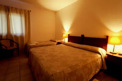 Letto o letti in una camera di Hotel Moderno
