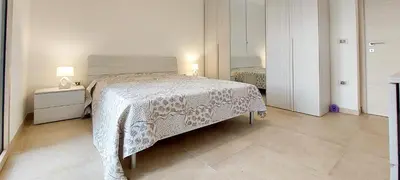 Letto o letti in una camera di Appartamento Brigida Bilocale 2 posti vicino al centro
