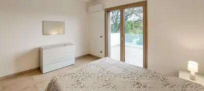 Letto o letti in una camera di Appartamento Brigida Bilocale 2 posti vicino al centro