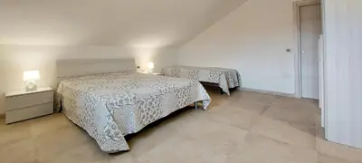 Letto o letti in una camera di Appartamento Brigida Bilocale 3 posti vicino al centro