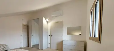 Letto o letti in una camera di Appartamento Brigida Bilocale 3 posti vicino al centro