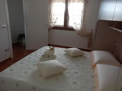 Letto o letti in una camera di Villa Aratha