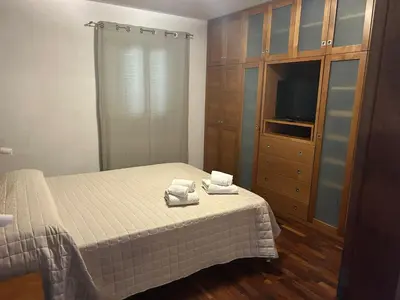 Letto o letti in una camera di Villa Panoramica Porto Istana