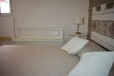 Letto o letti in una camera di Villa con Splendido Giardino e Vista Mare a Osseddu - Olbia