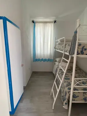 Letto o letti in una camera di La casa sull’acqua