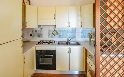 Cucina o angolo cottura di Appartamento Gelsomino, con A/C