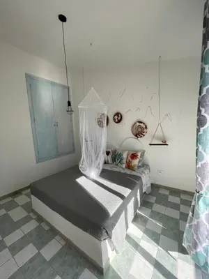 Letto o letti in una camera di Casa Vacanze Profumo di Mare