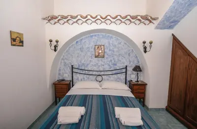 Letto o letti in una camera di Villa Aurora con A/C