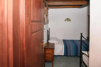 Letto o letti in una camera di Villa Aurora con A/C
