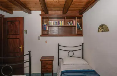 Letto o letti in una camera di Villa Aurora con A/C
