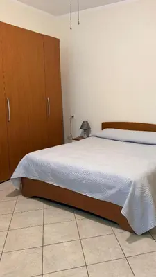 Letto o letti in una camera di Luciana House