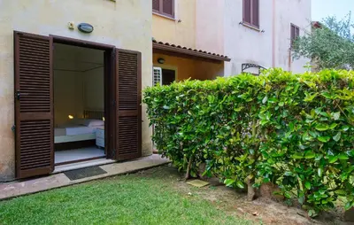 Giardino di Cozy Apartment In Porto San Paolo