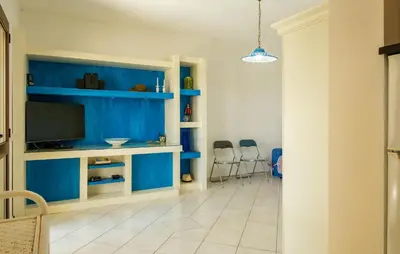TV o dispositivi per l'intrattenimento presso Cozy Apartment In Porto San Paolo