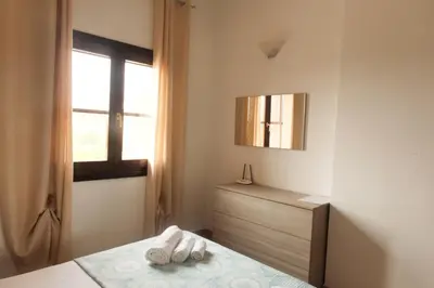 Letto o letti in una camera di Casa Cristallina
