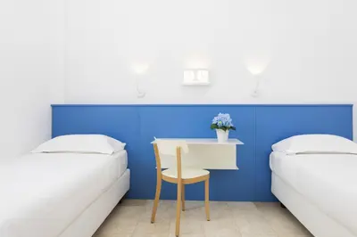 Letto o letti in una camera di Sentido Tirreno Resort