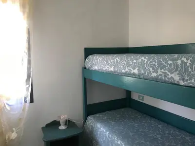 Letto o letti in una camera di Casa Isidoro