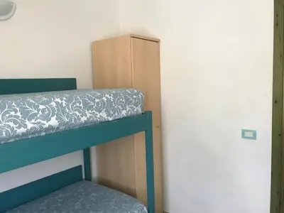 Letto o letti in una camera di Casa Isidoro