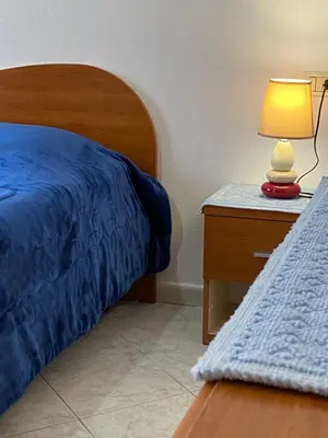 Letto o letti in una camera di Fabio's House