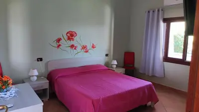 Letto o letti in una camera di casa l'Ulivariu affittacamere