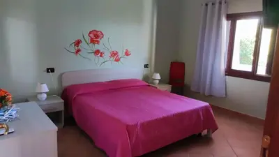 Letto o letti in una camera di casa l'Ulivariu affittacamere