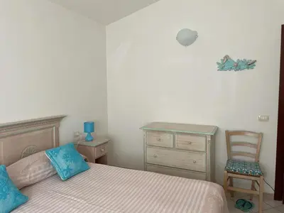 Letto o letti in una camera di Casa Giulia