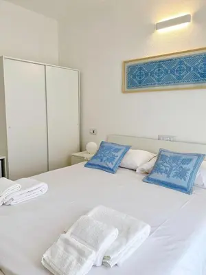 Letto o letti in una camera di Cocciu D'Amuri