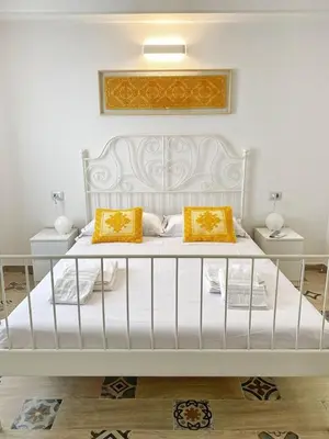 Letto o letti in una camera di Cocciu D'Amuri