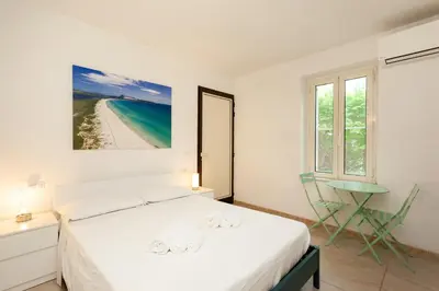 Letto o letti in una camera di San Teodoro - Civico 35