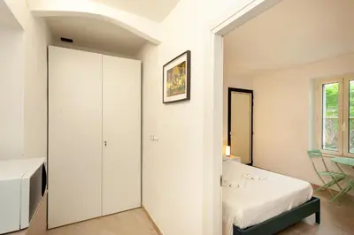 Letto o letti in una camera di San Teodoro - Civico 35