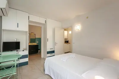 Letto o letti in una camera di San Teodoro - Civico 35