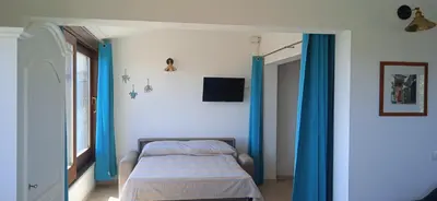 Letto o letti in una camera di Case belvedere