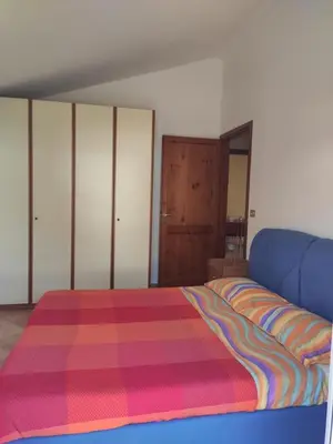 Letto o letti in una camera di Appartamento Mirto