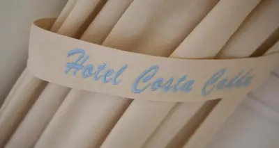 Certificato, attestato, insegna o altro documento esposto da Hotel Costa Caddu