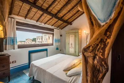 Letto o letti in una camera di Hotel Anticos Palathos