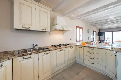 Cucina o angolo cottura di AffittaSardegna-Casa Vedetta