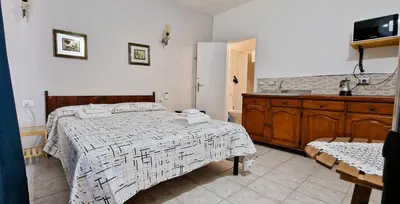 Letto o letti in una camera di 3 Mini Studios in Siniscola