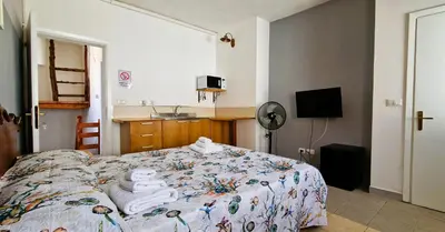 Letto o letti in una camera di 3 Mini Studios in Siniscola
