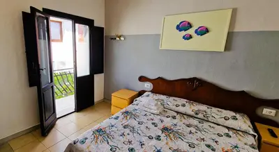 Letto o letti in una camera di 3 Mini Studios in Siniscola
